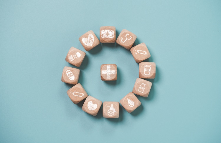 wooden-block-cube-which-print-screen-health-care-medical-icons-healthy-wellness-concept-1
